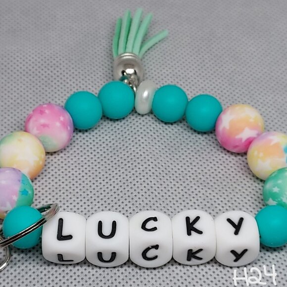 Set of 3 Silicone Keychains with Tassels - Picture 2 of 3